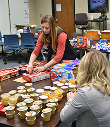 HIMS Club prepares holiday care packages